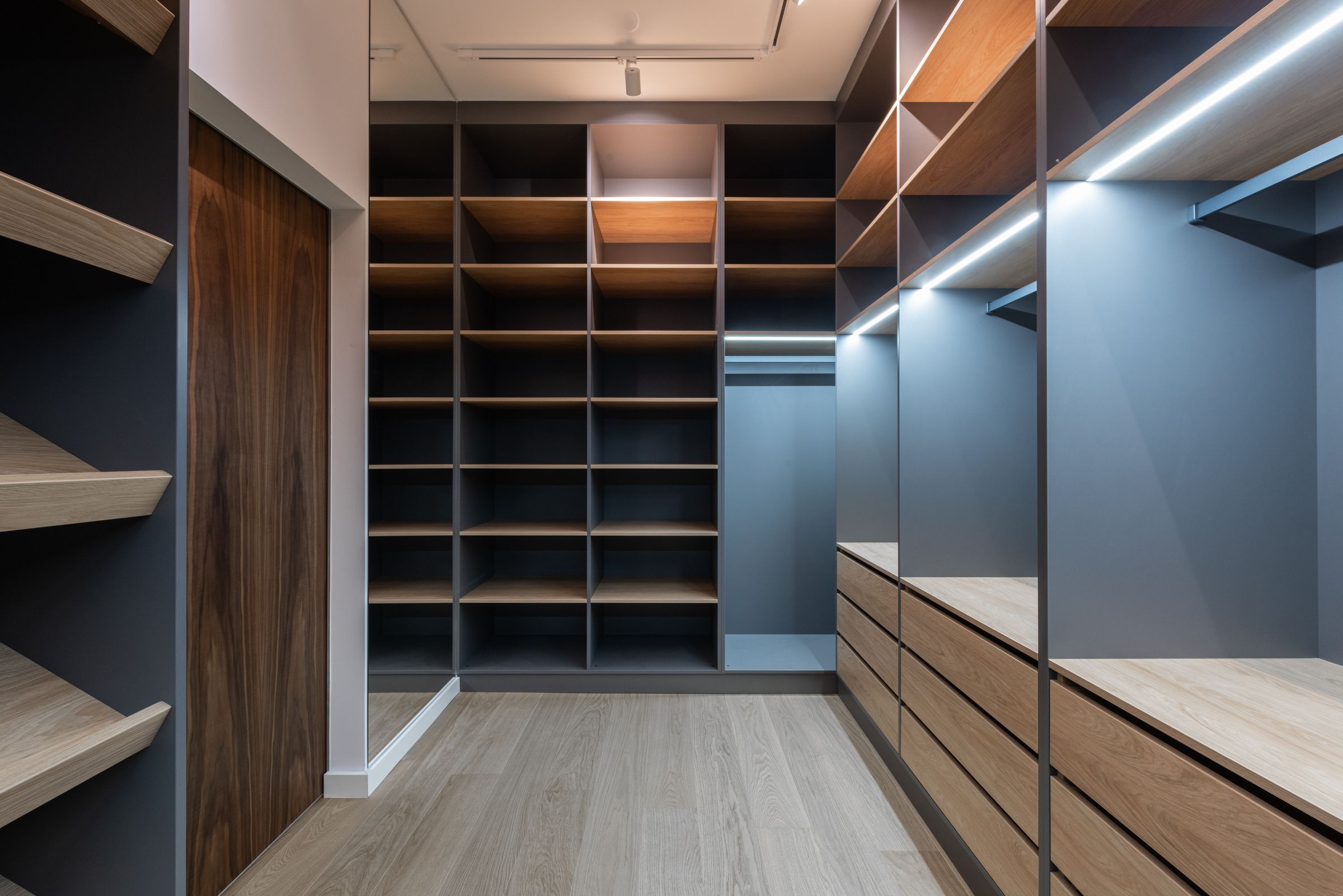 A wardrobe interior with well-planned storage and premium detailing